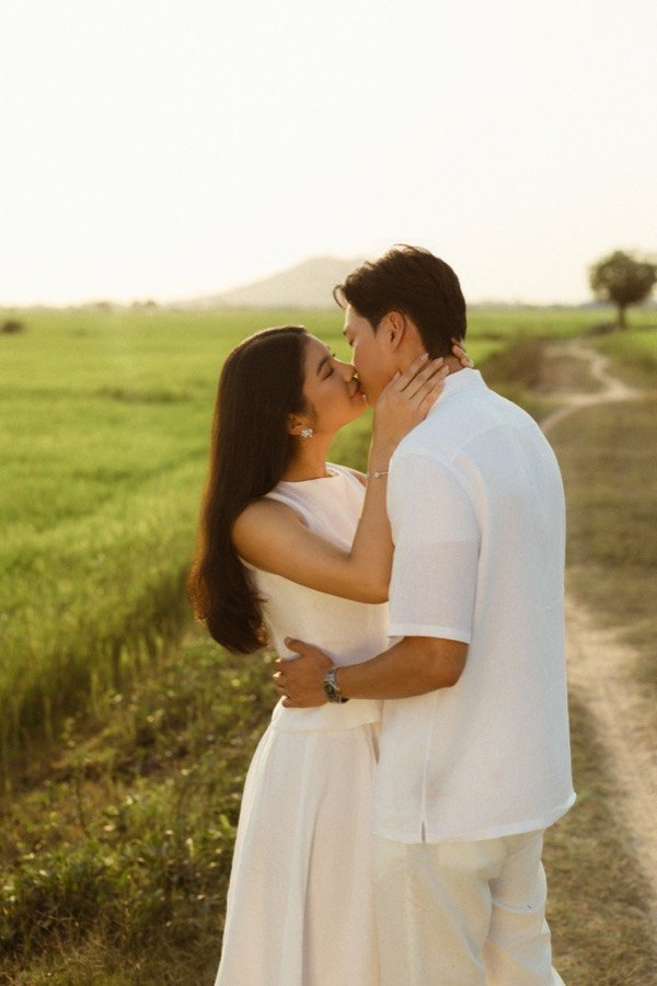 Vireak and Mony in a rice field at golden hour